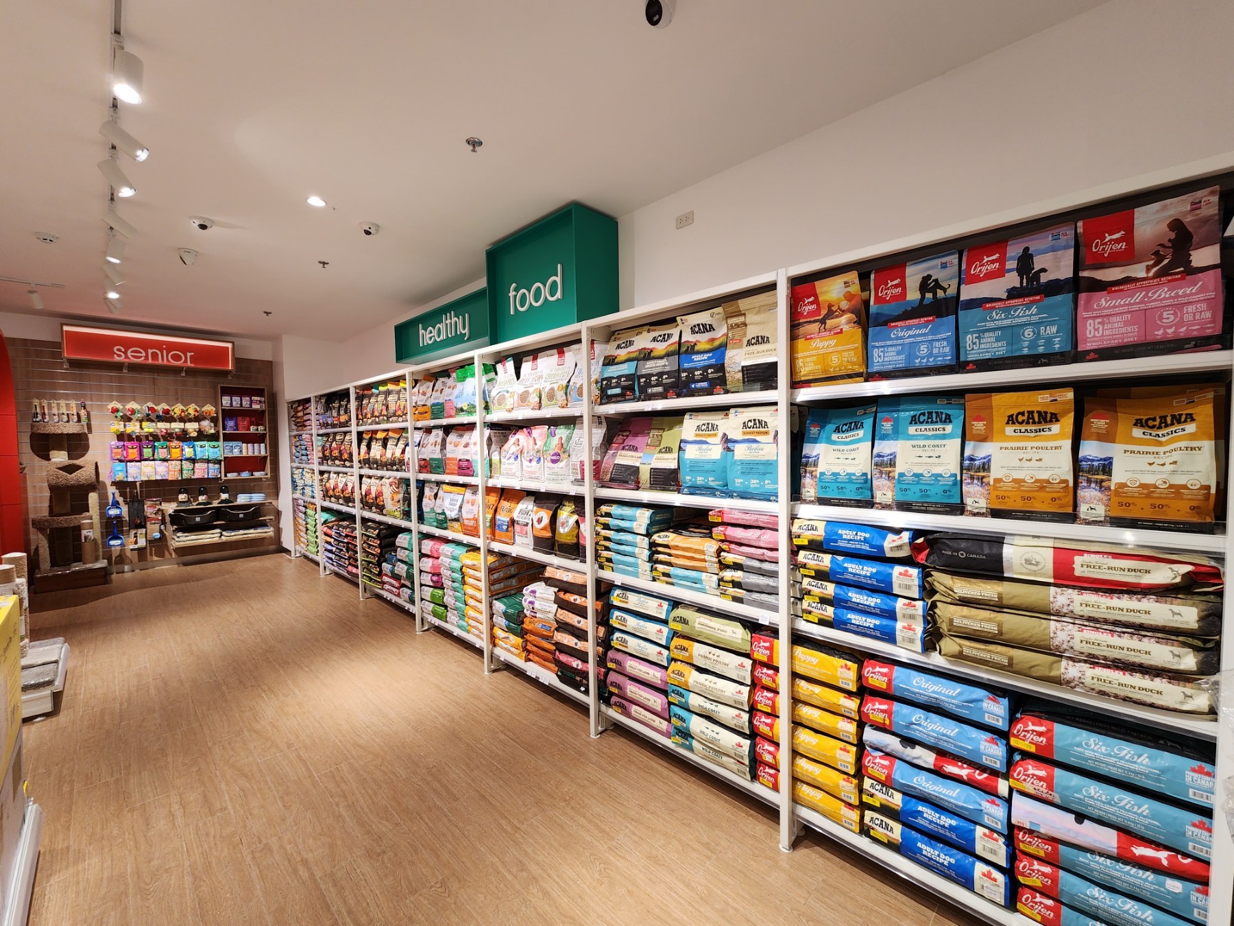 Wall shelving and retail aisle at Bow&Wow.