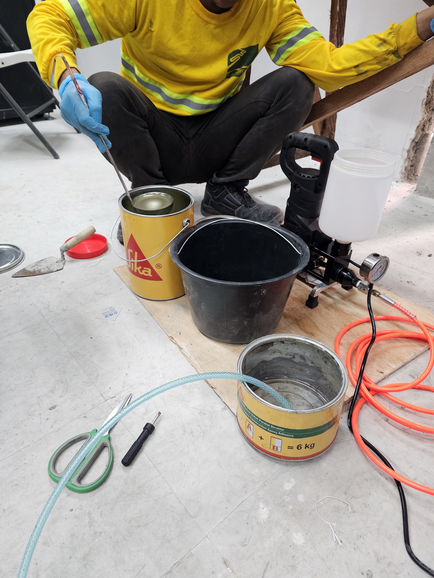 Materials being prepared for shelter retrofitting works.