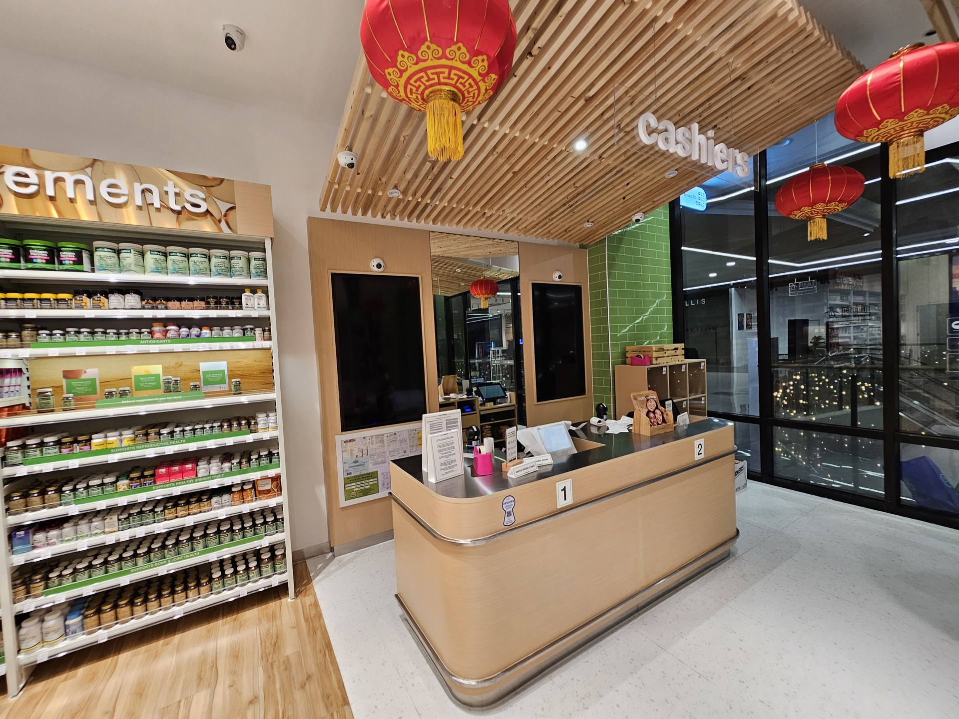 Cashier counter and timber ceiling at Healthy Options SM JMall.