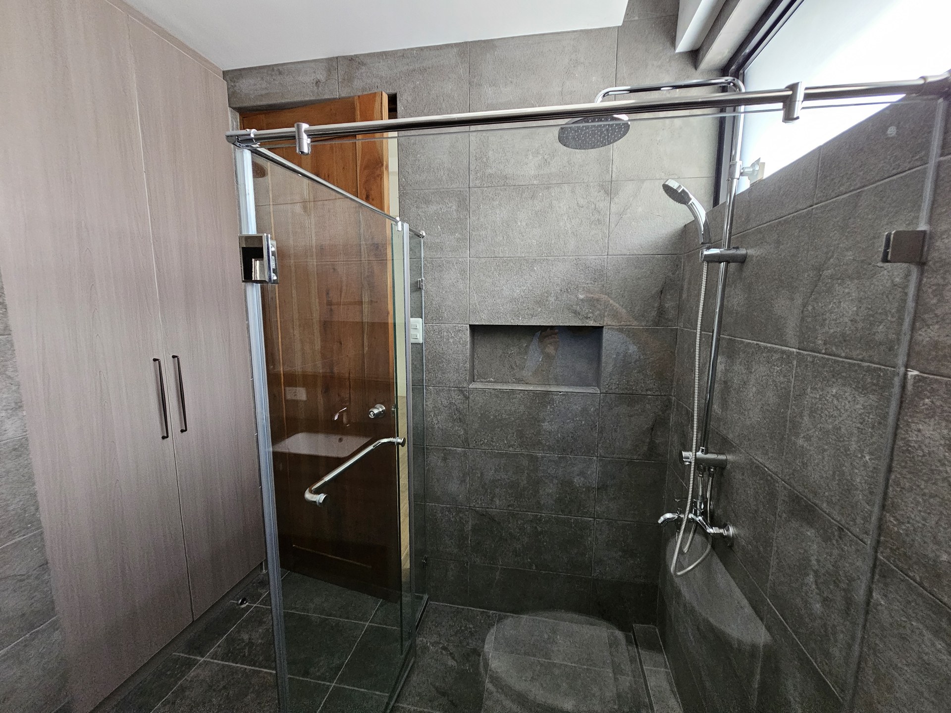 Shower enclosure and bathroom finishes.